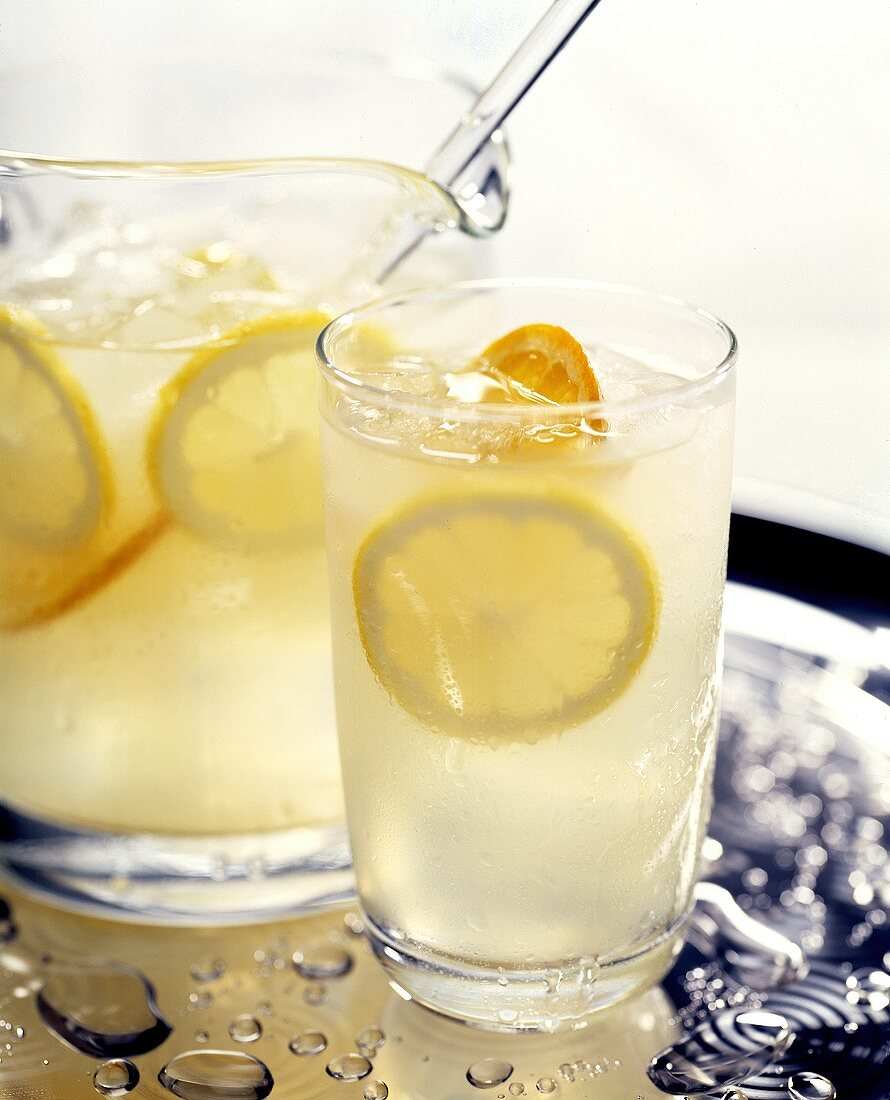 A Glass and Pitcher of Lemonade