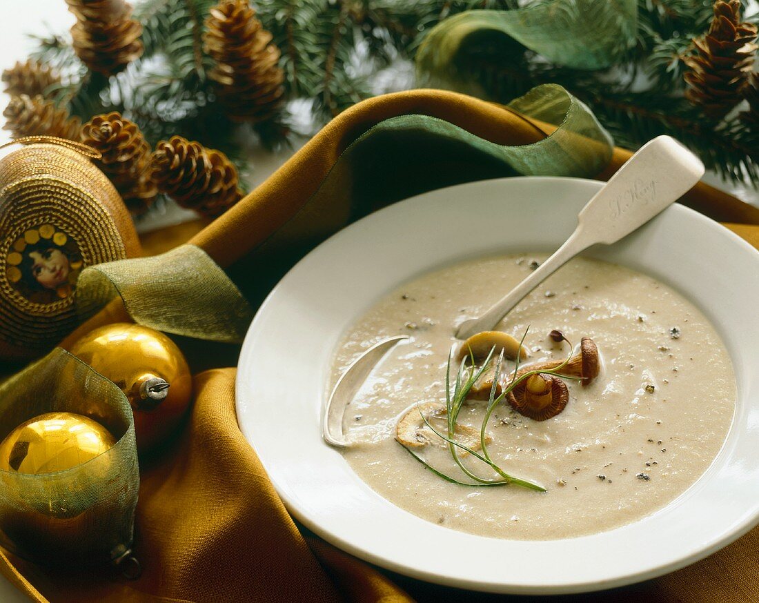 Bowl of Cream of Mushroom Soup with Holiday Decorations