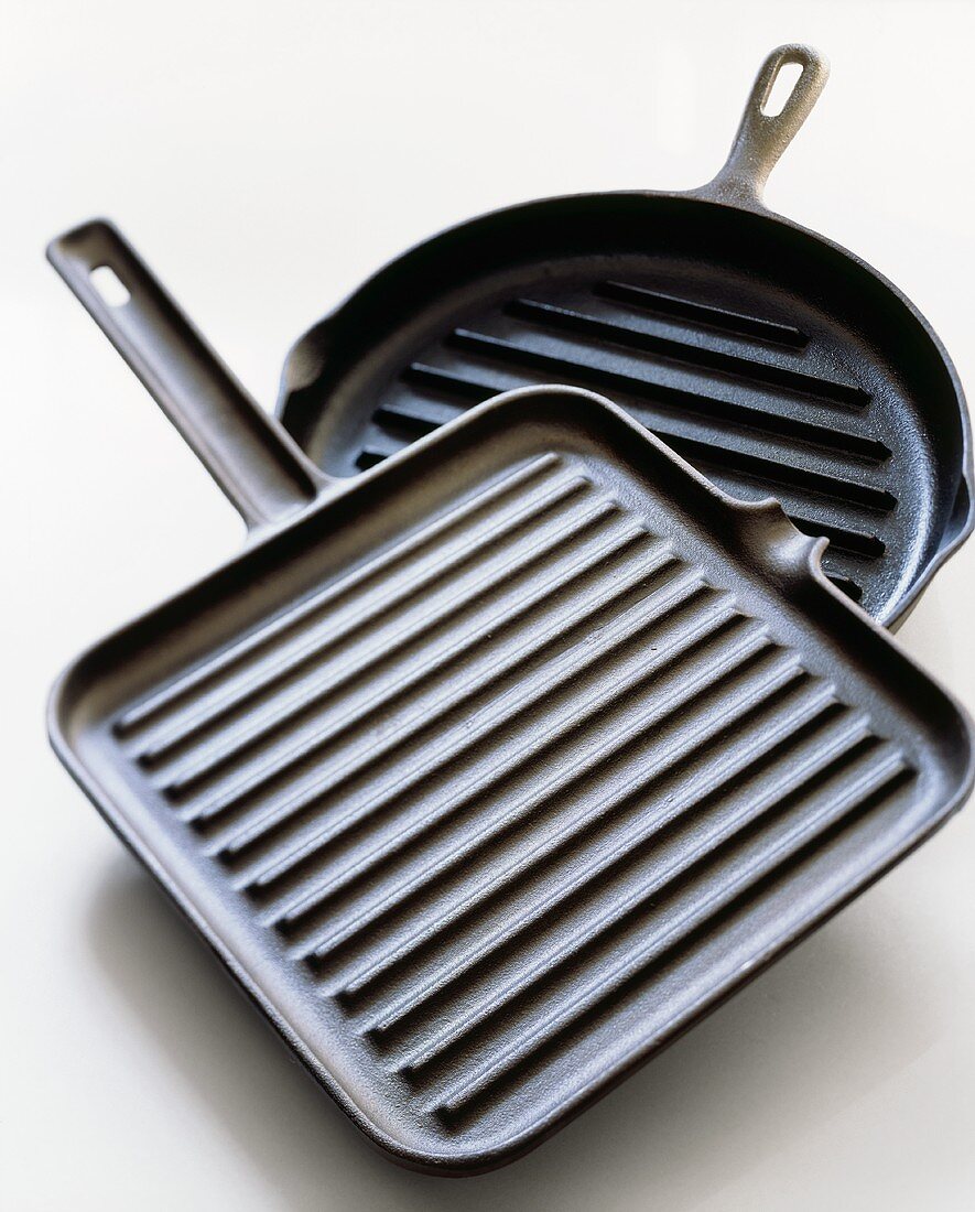Two Non-stick Grill Pans; One Square and One Round; White Background
