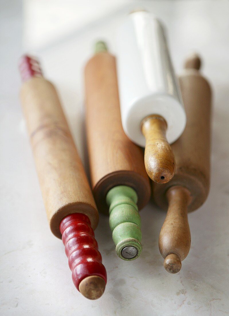 Four old rolling pins