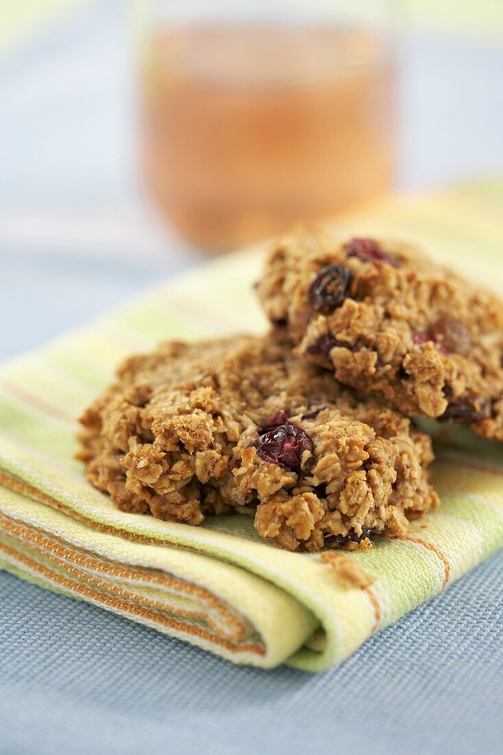 Oat and cranberry cookies on napkin