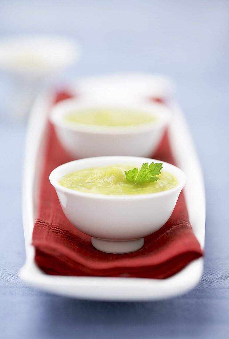 Pea soup in three bowls