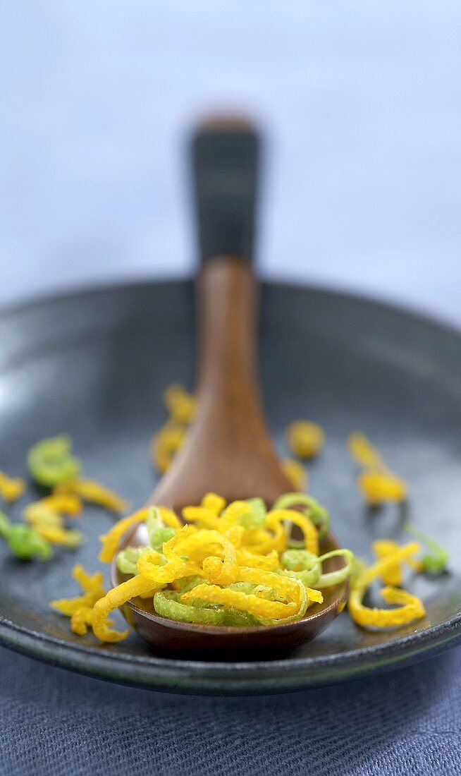 Lime and Orange Zest in a Spoon and On a Plate