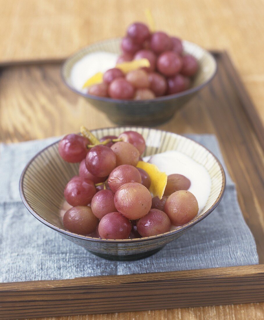 Red grapes with yoghurt and lemon peel