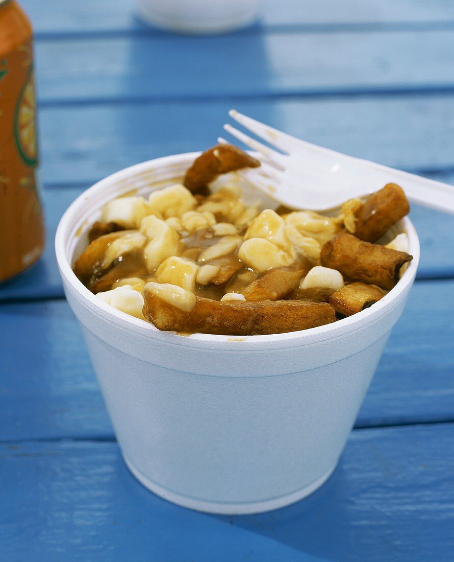 Poutine (Chips with curd cheese and gravy, Canada)