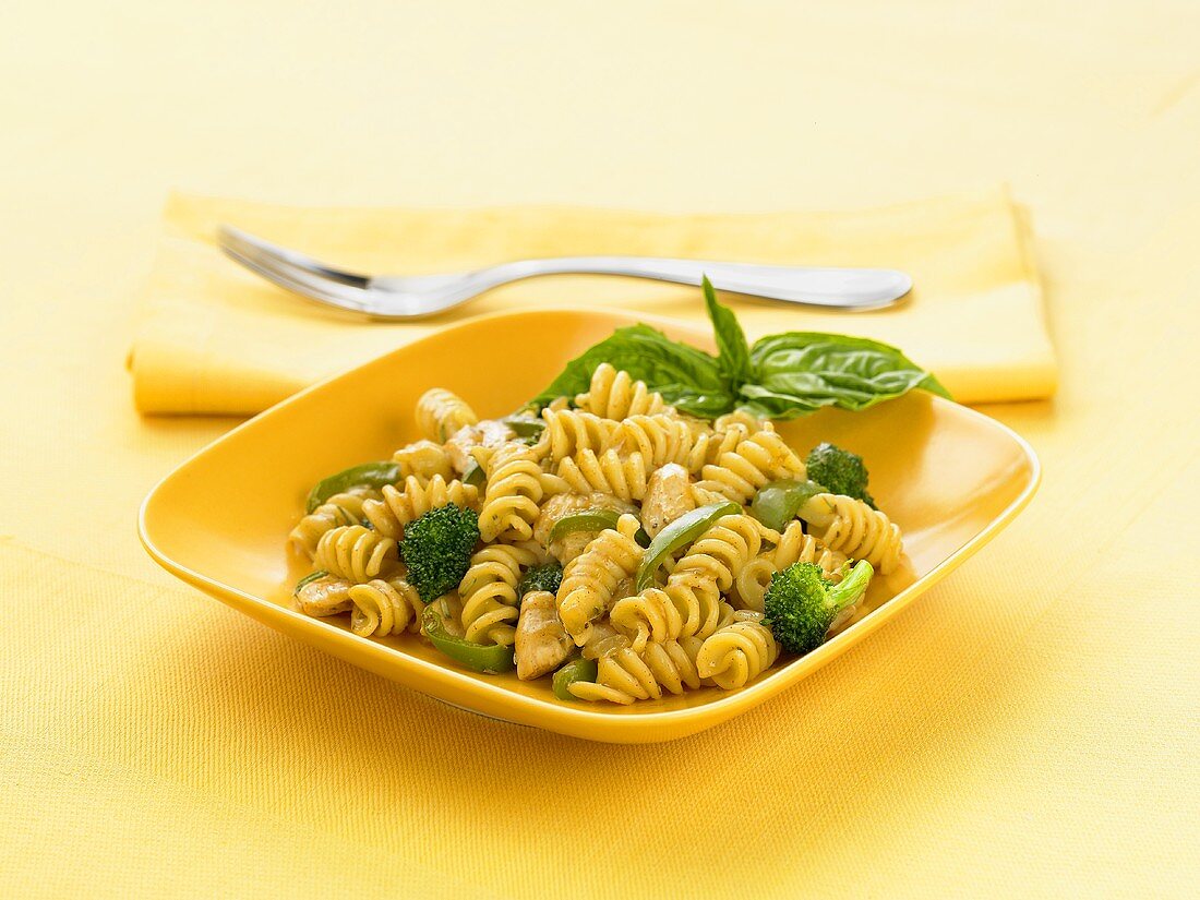 Bowl of Rotini Pasta with Broccoli and Basil Sprig, Fork