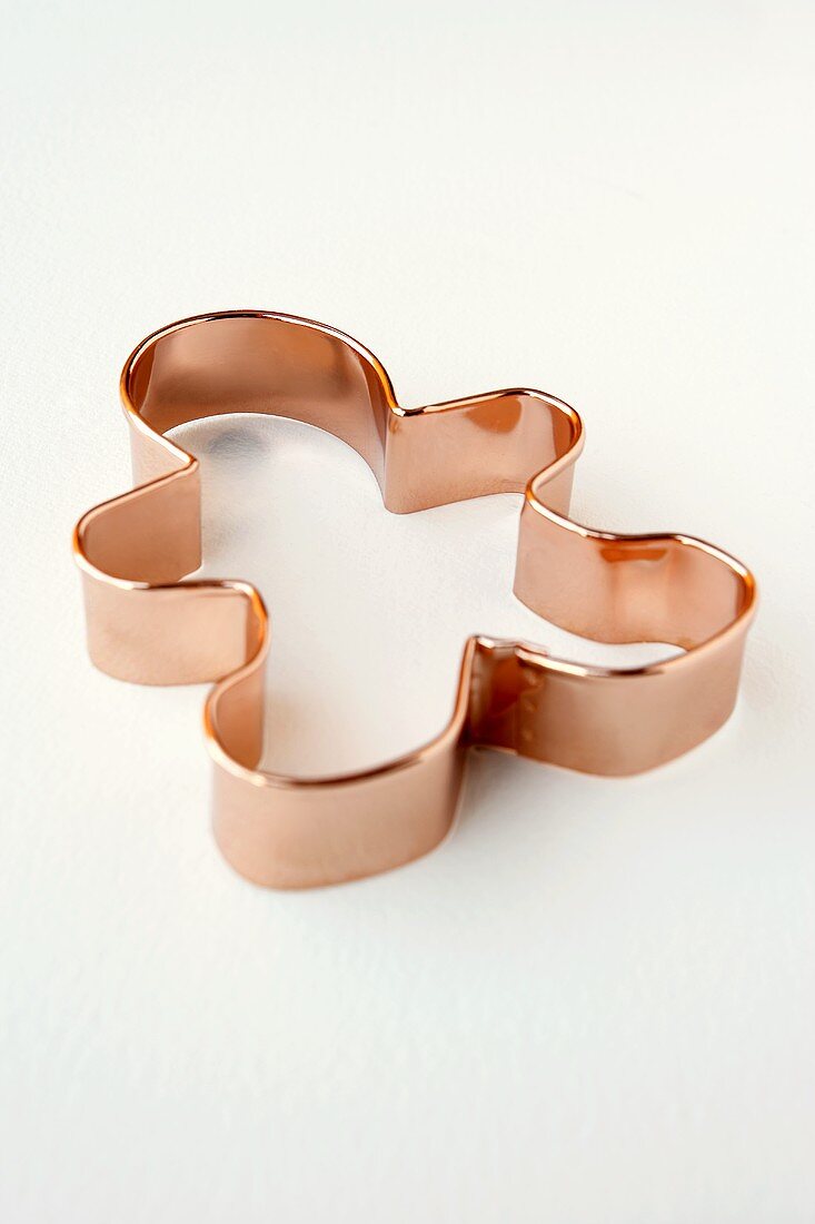 Copper Gingerbread Man Cookie Cutter on White Background