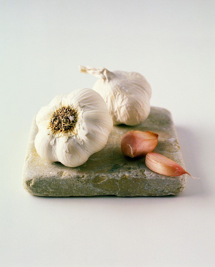 Garlic Bulbs and Cloves on Tile