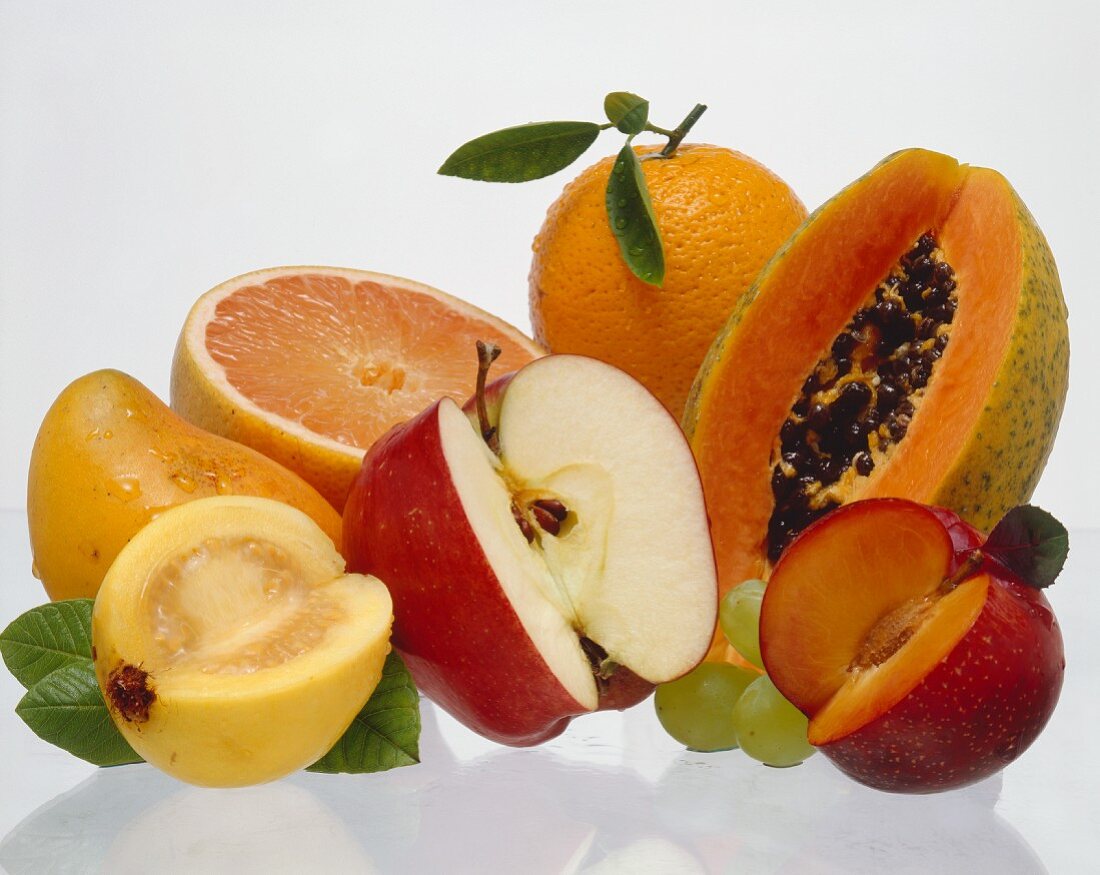 Assorted Fruit with Slices Removed; White Background