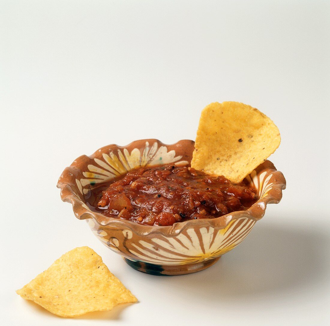 Salsa in a Bowl with a Tortilla Chip