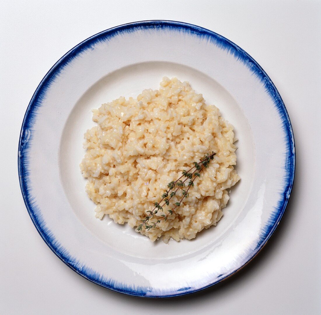Risotto with a Thyme Sprig on a Plate; From Above