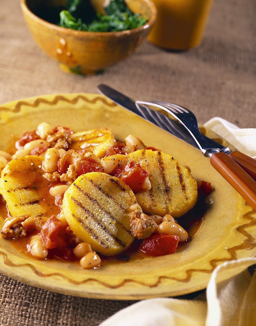 Sliced Polenta with Tomatoes, Sausage and Beans