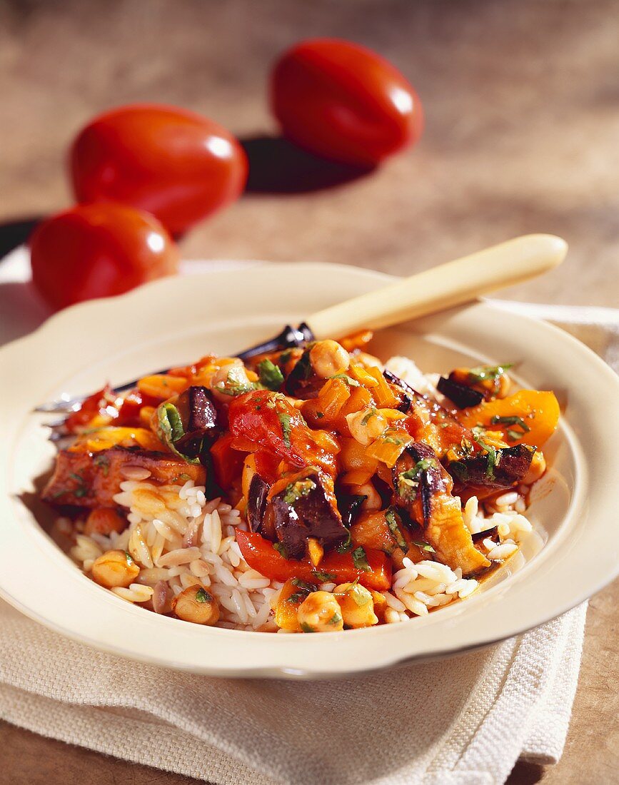 Eggplant Stew with Tomatoes and Chickpeas on Rice Pilaf