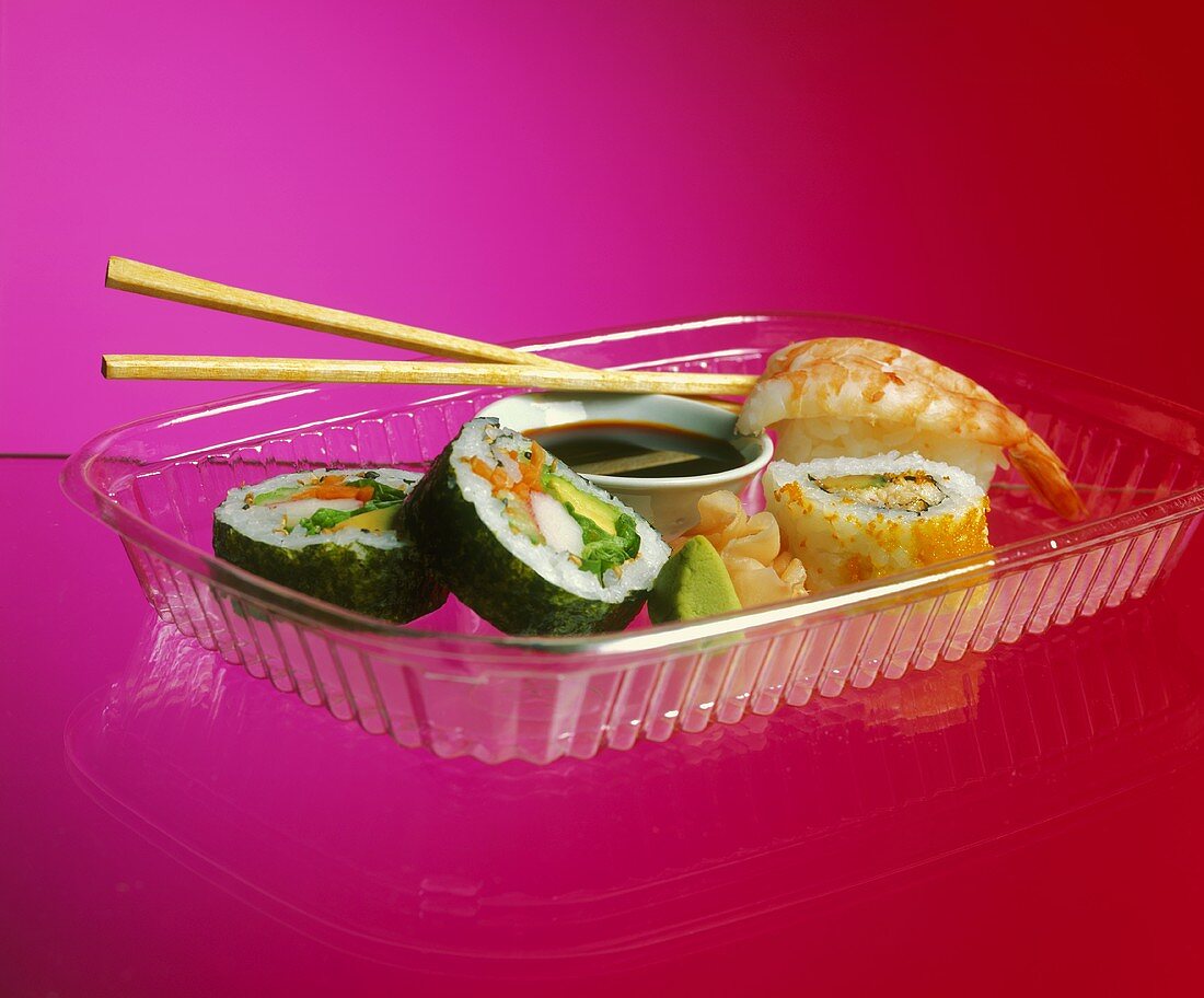 Assorted Sushi with Sauce and Chopsticks; To-Go