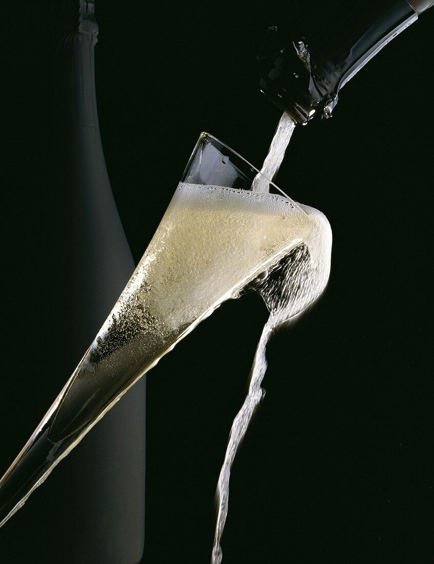 Pouring Champagne into a Glass