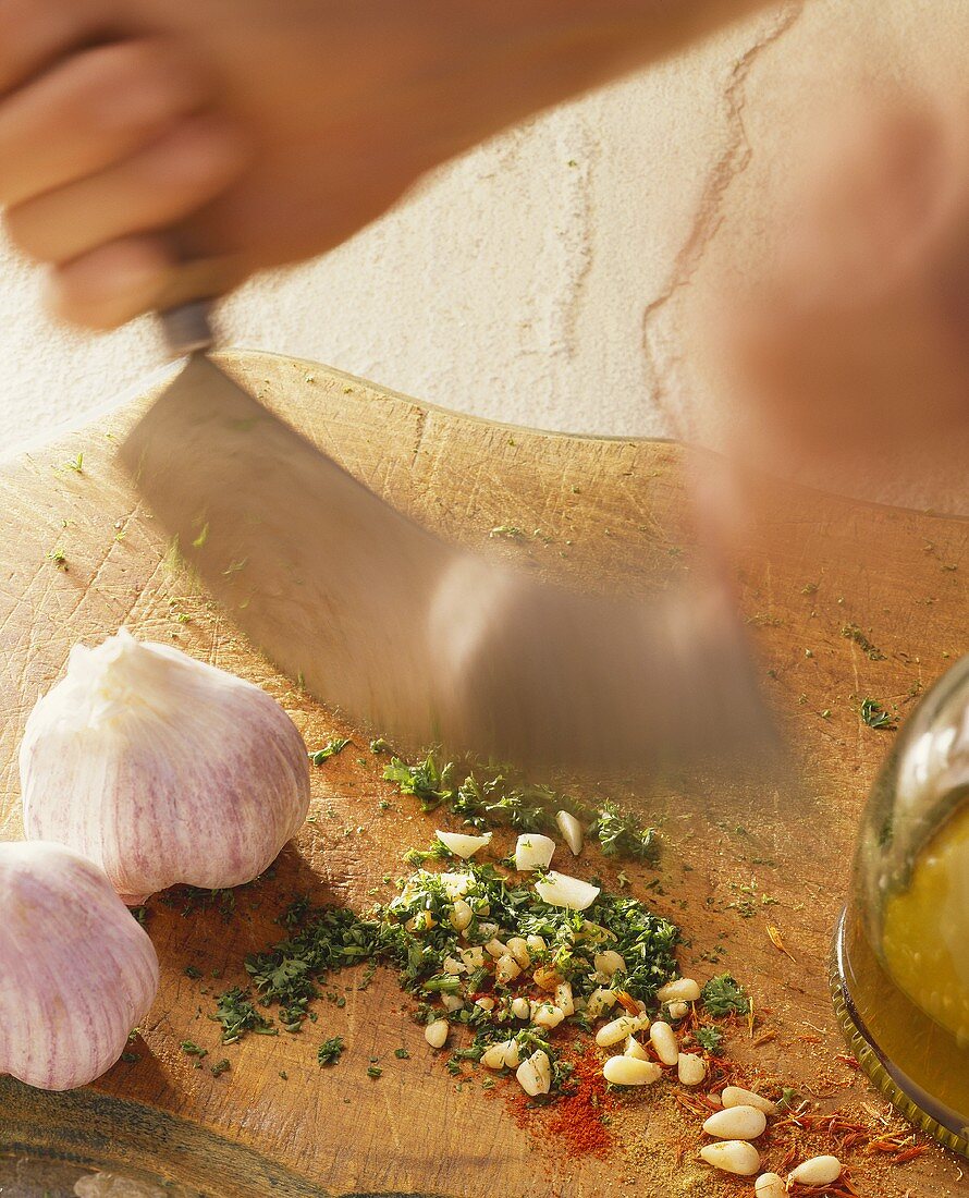 Chopping Garlic and Herbs