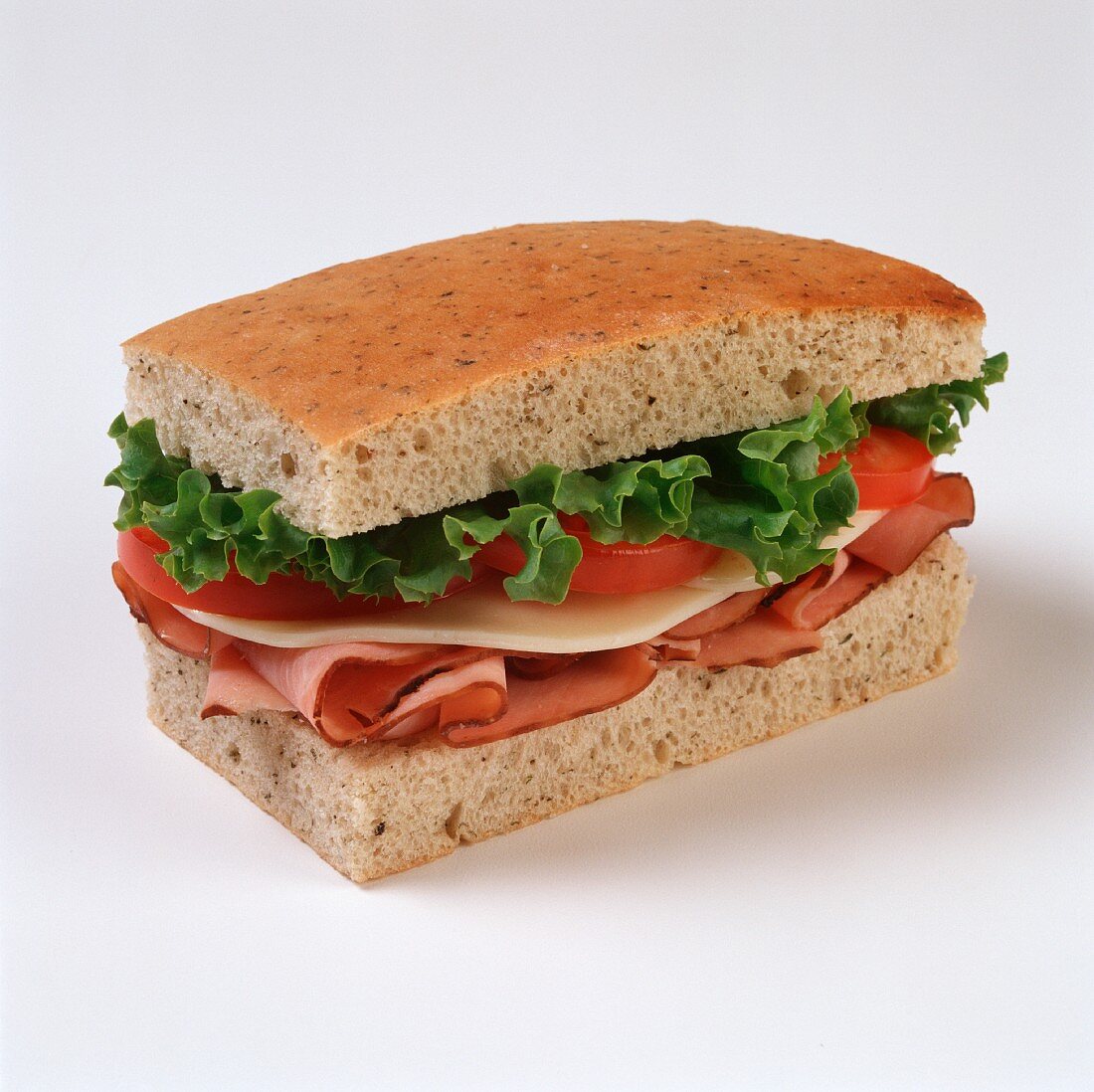 Ham and Cheese Sandwich on Focaccia Bread; White Background