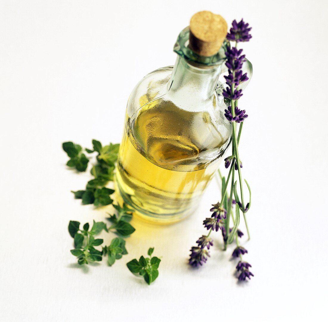 Bottle of Vinegar with Fresh Herbs