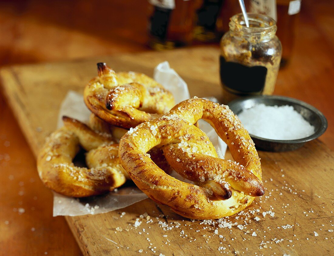 Soft Pretzles with a Dish of Salt and a Crock of Mustard