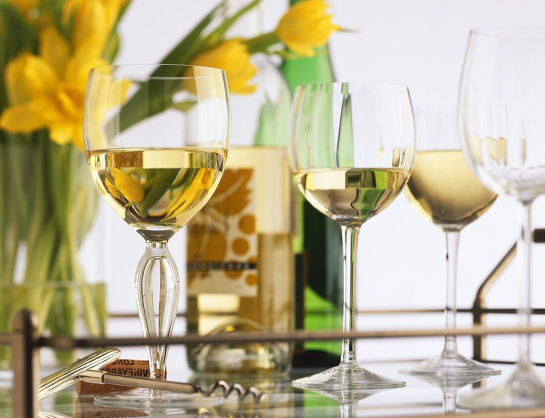 White Wine in Glasses on a Tray with Flowers