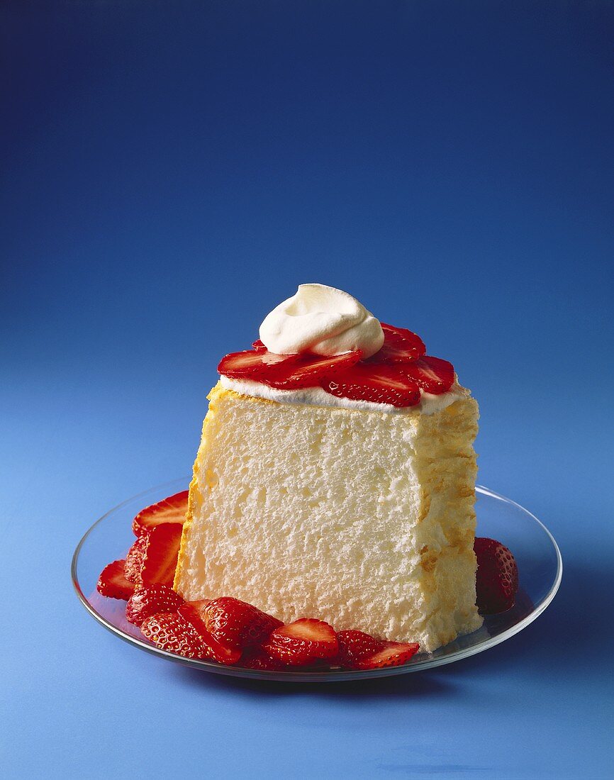 Angel Food Cake with Sliced Strawberries and Whipped Cream