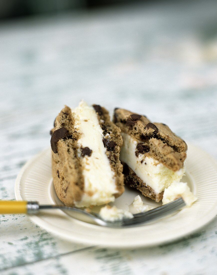 Filled chocolate chip cookies with vanilla ice cream