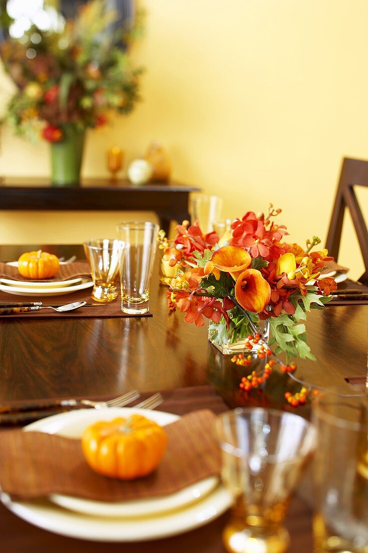 Table Set with Gourds and Autumn Floral Centerpiece