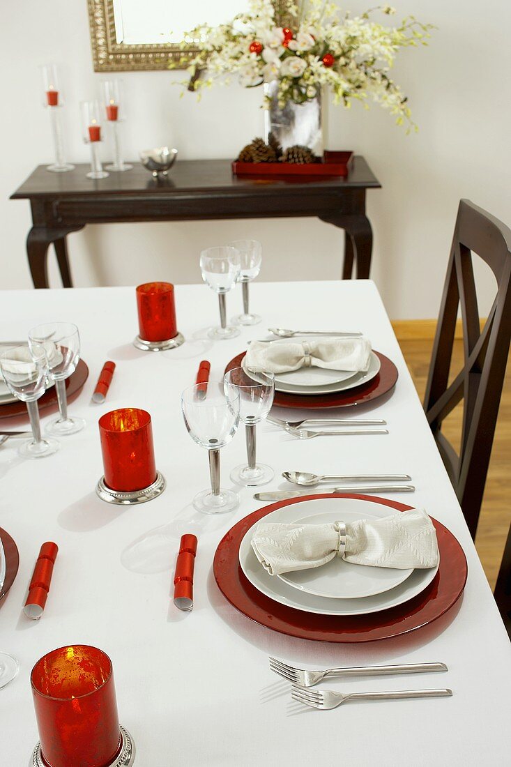 Table Set with Red Candles for Christmas Dinner