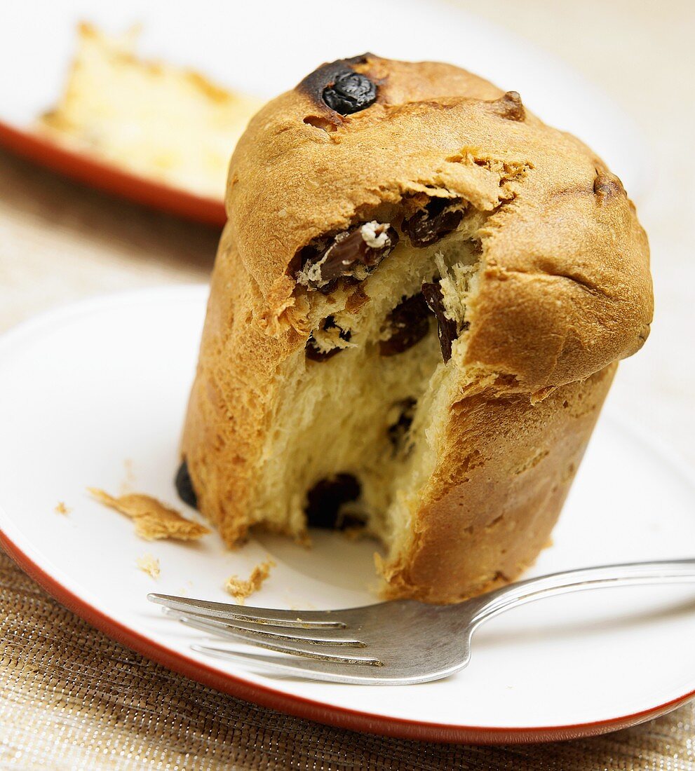 Panettone on a Plate with Slice Removed
