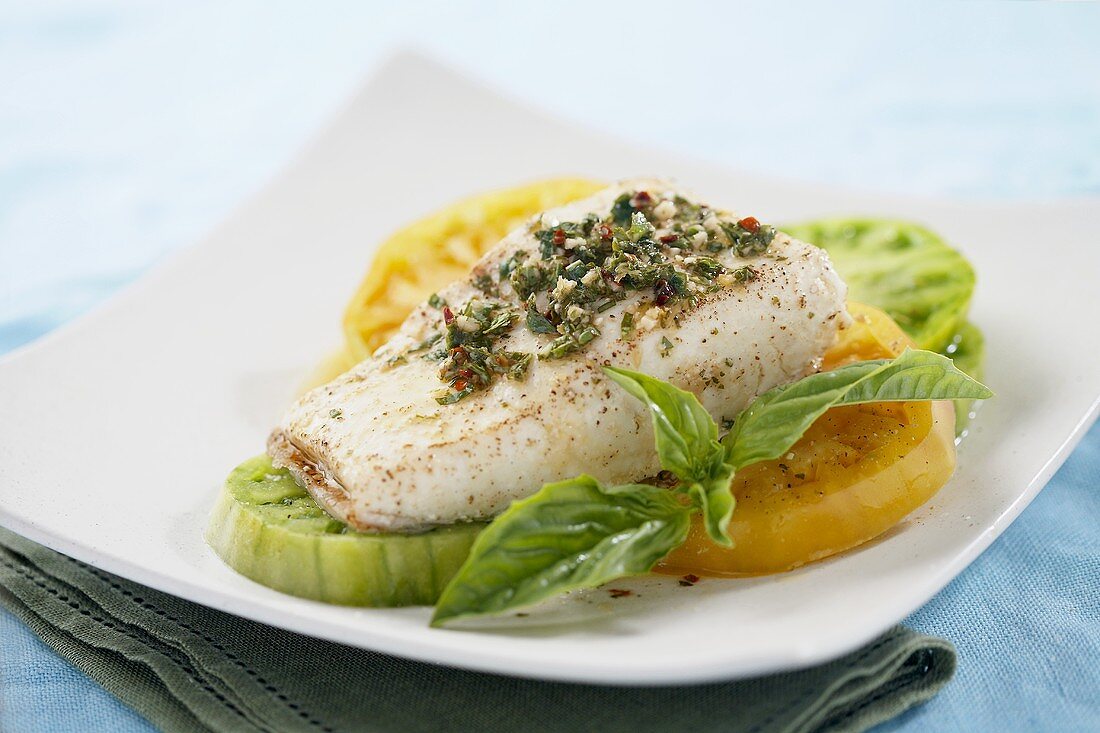 Halibut with Chimichurri Sauce On Yellow and Green Tomatoes
