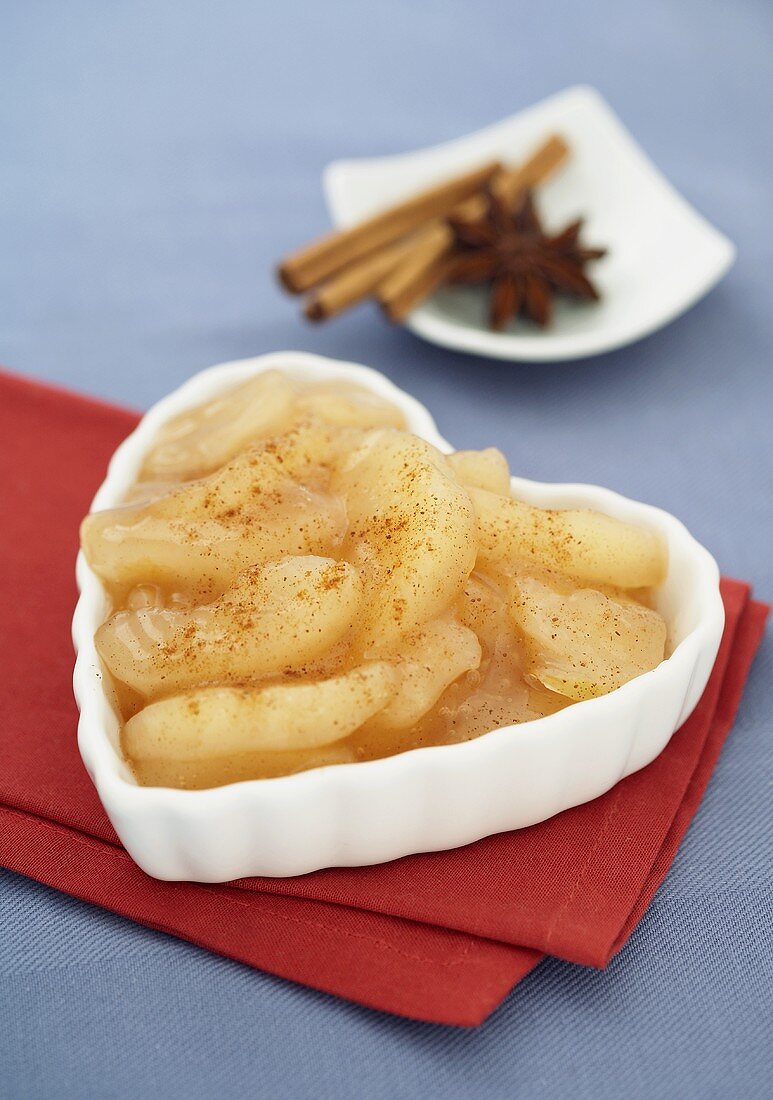 Heart Shaped Ramekin Filled with Apple Pie Filling, Cinnamon and Star Anise