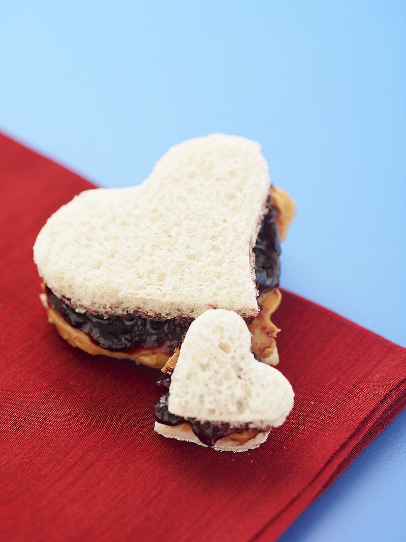 Two Heart Shaped Peanut Butter and Jelly Sandwich, One Big and One Small