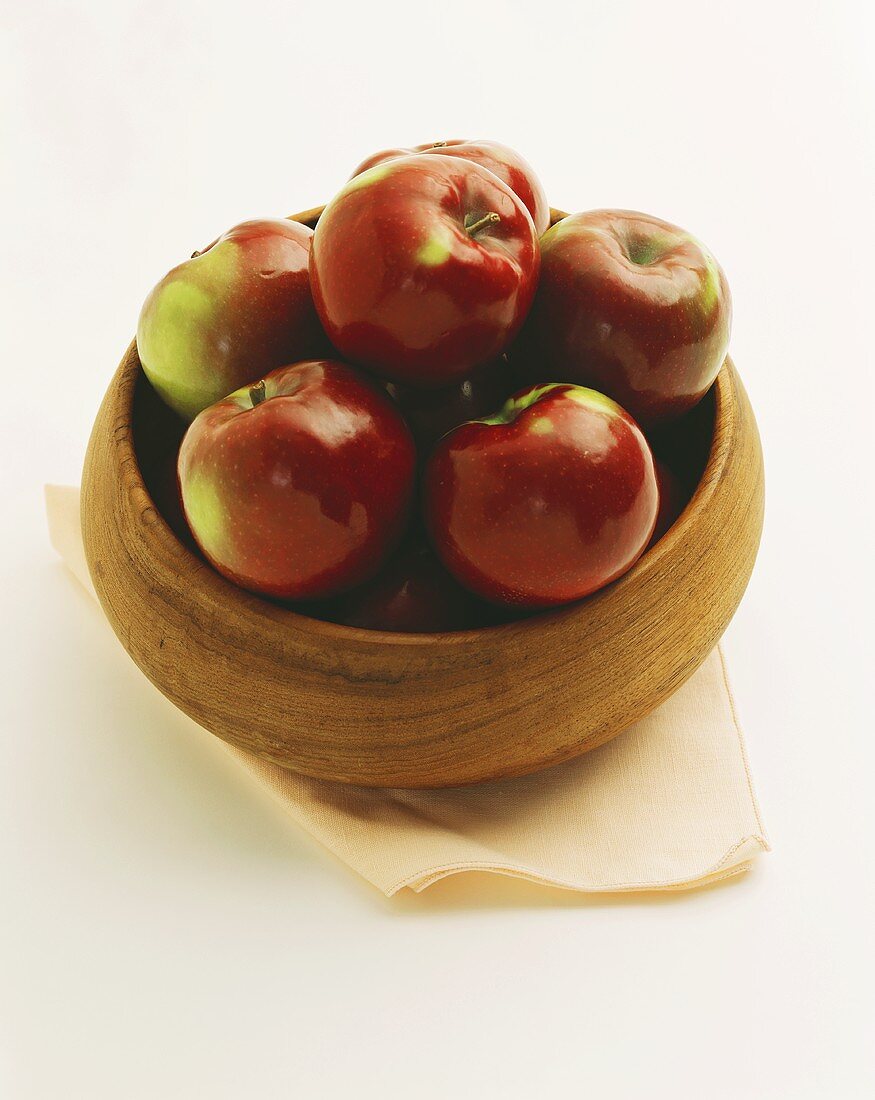 Red Apples in a Wooden Bowl