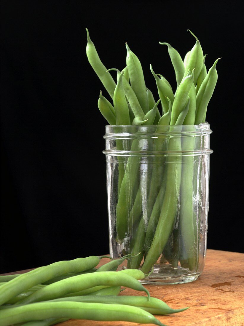 Fresh Green Beans in and Beside a Jar
