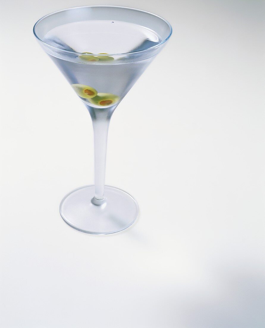 Martini with Two Olives on White Background