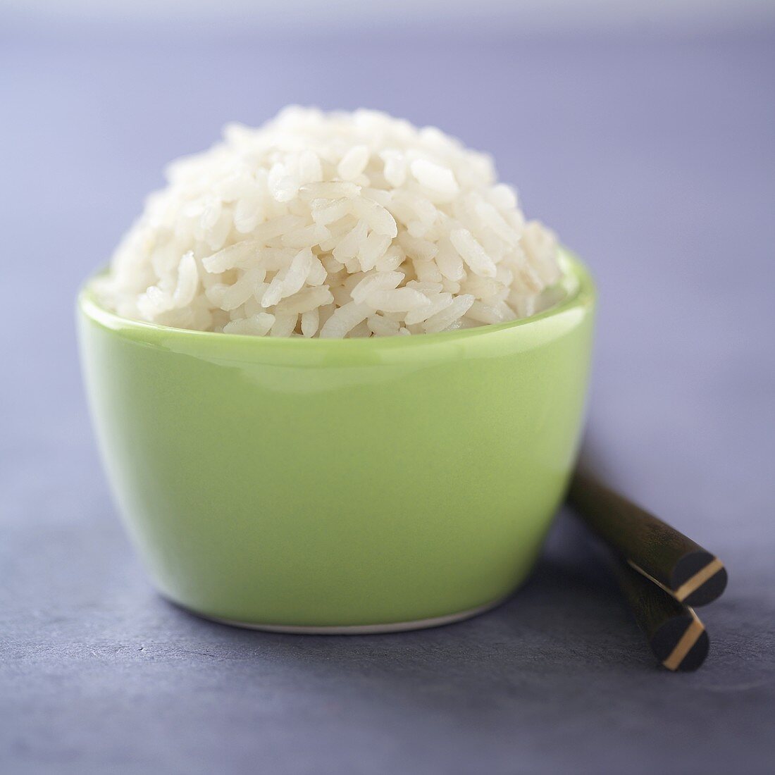 Small Green Bowl of Cooked White Rice, Chopsticks