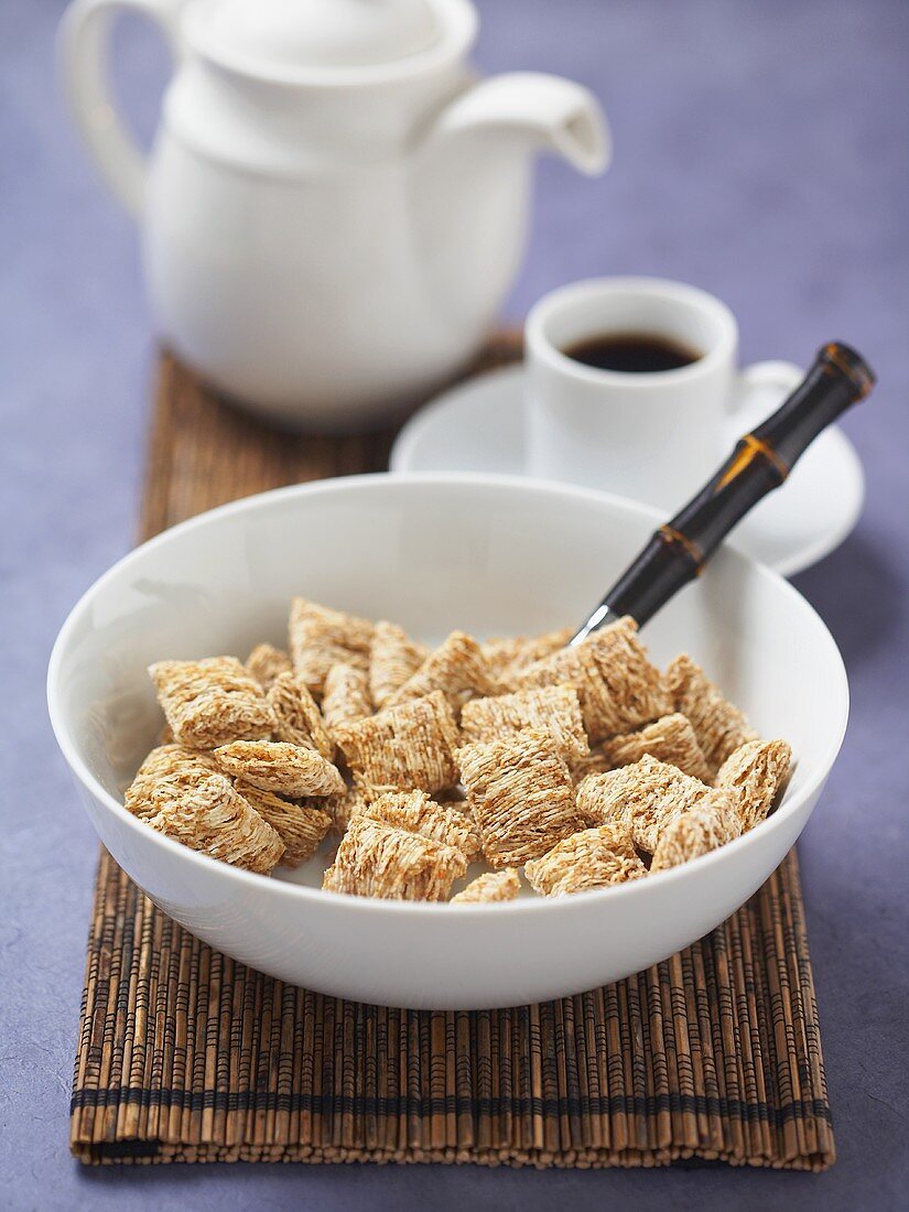 A Bowl of Shredded Wheat with Coffee