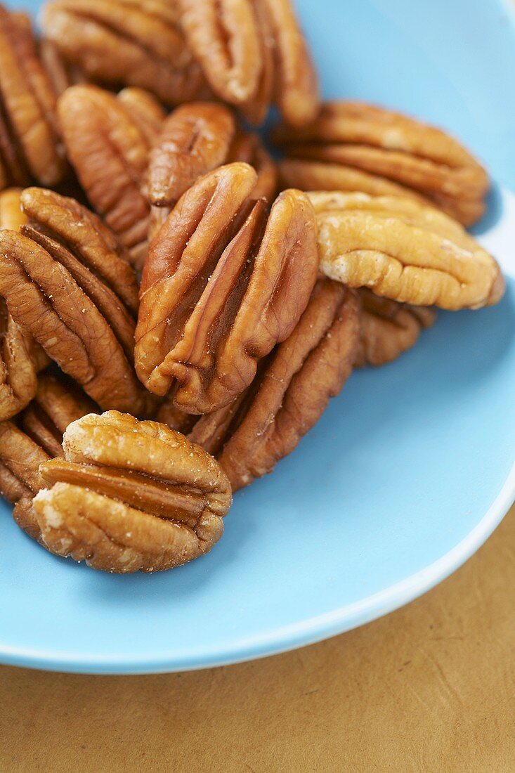 Many Whole Pecans on a Plate