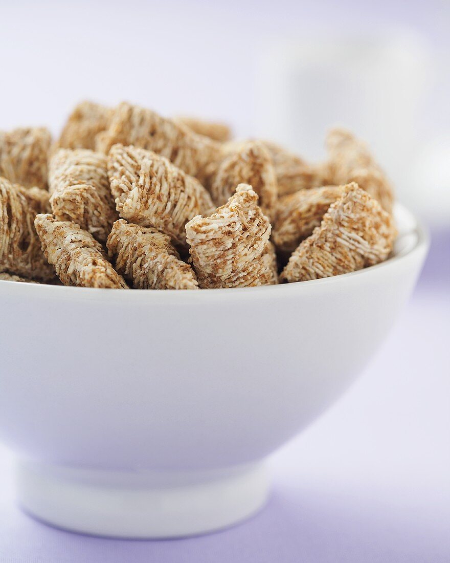 Close Up of a Bowl of Shredded Wheat Cereal