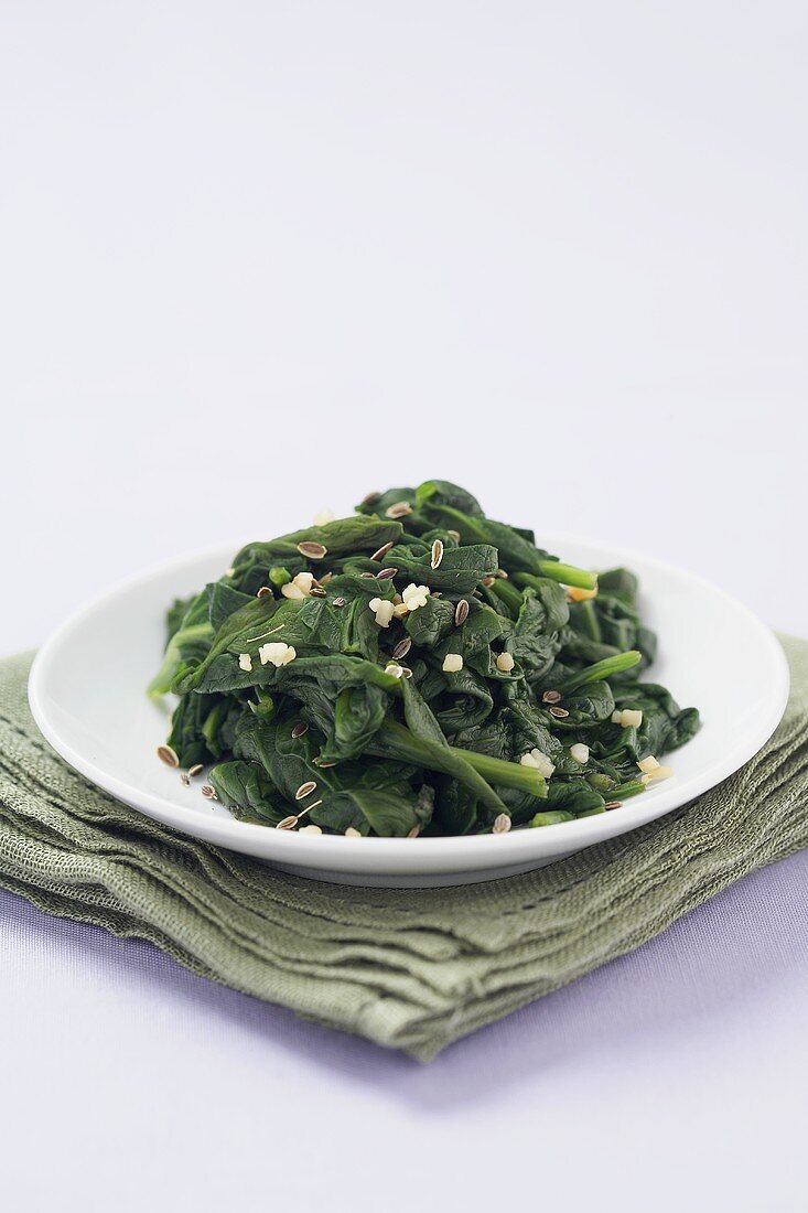 Plate of Steamed Spinach with Dill Seeds