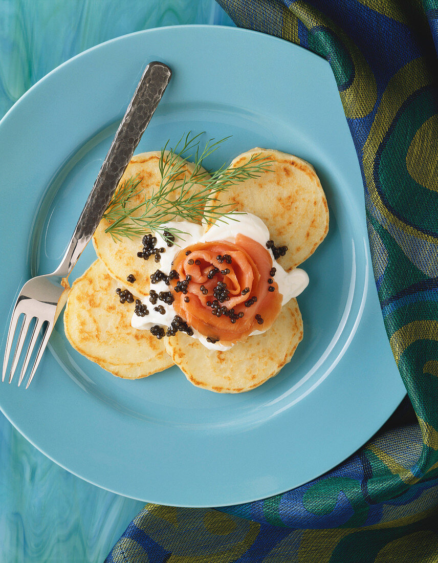 Serving of Blini Topped with Salmon, Caviar and Sour Cream