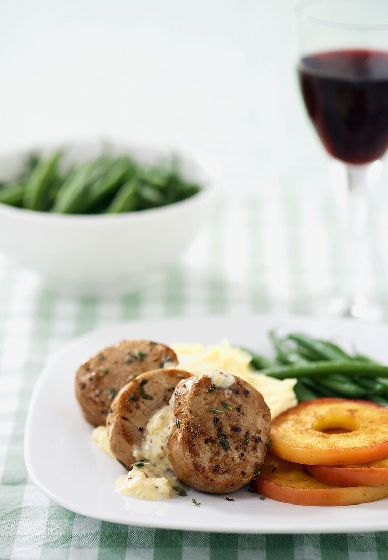 Sliced Pork with Apple Sauce and Apple Rings