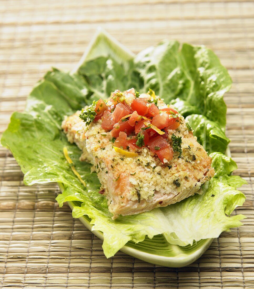 Salmon Topped with Tomato and Orange Salsa on a Lettuce Leaf