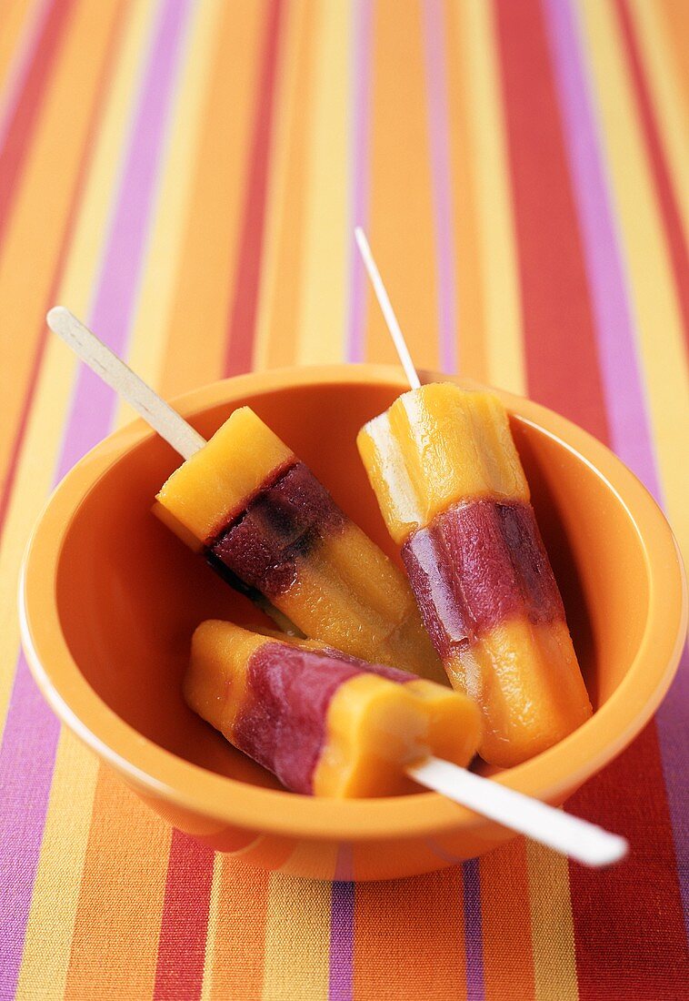 Bowl of Layered Fruit Popsicles