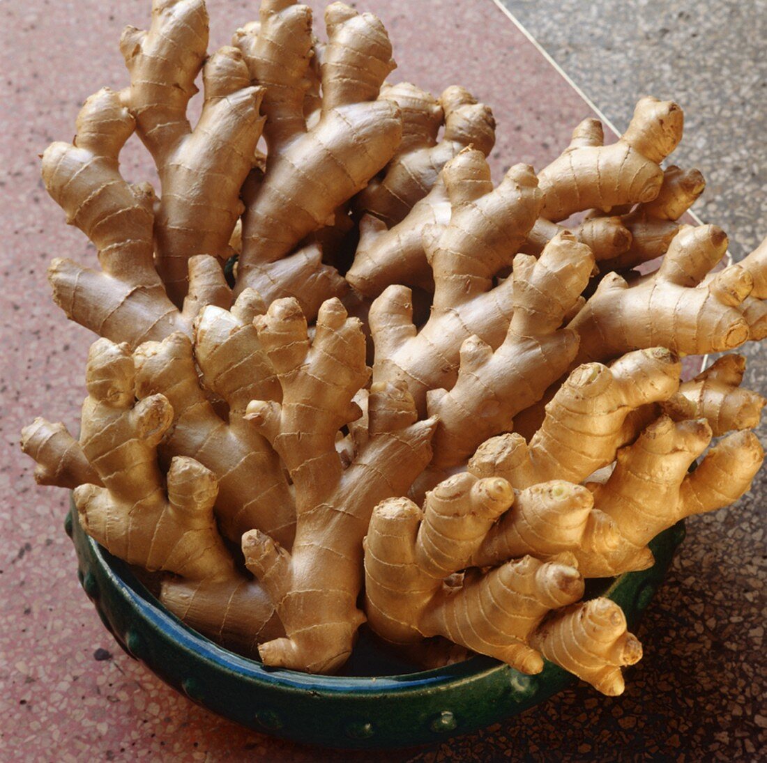 Many Ginger Roots in a Bowl