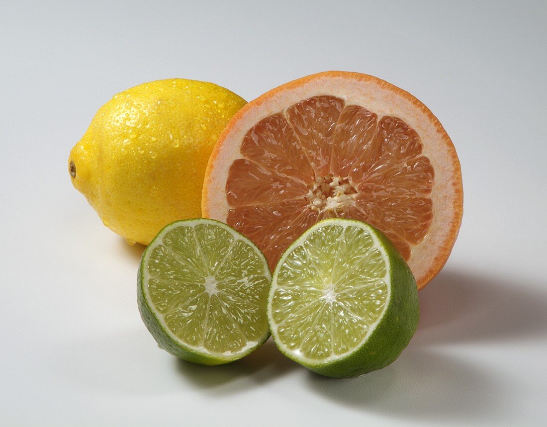 Three Assorted Citrus Fruit, Lemon, Grapefruit, Lime