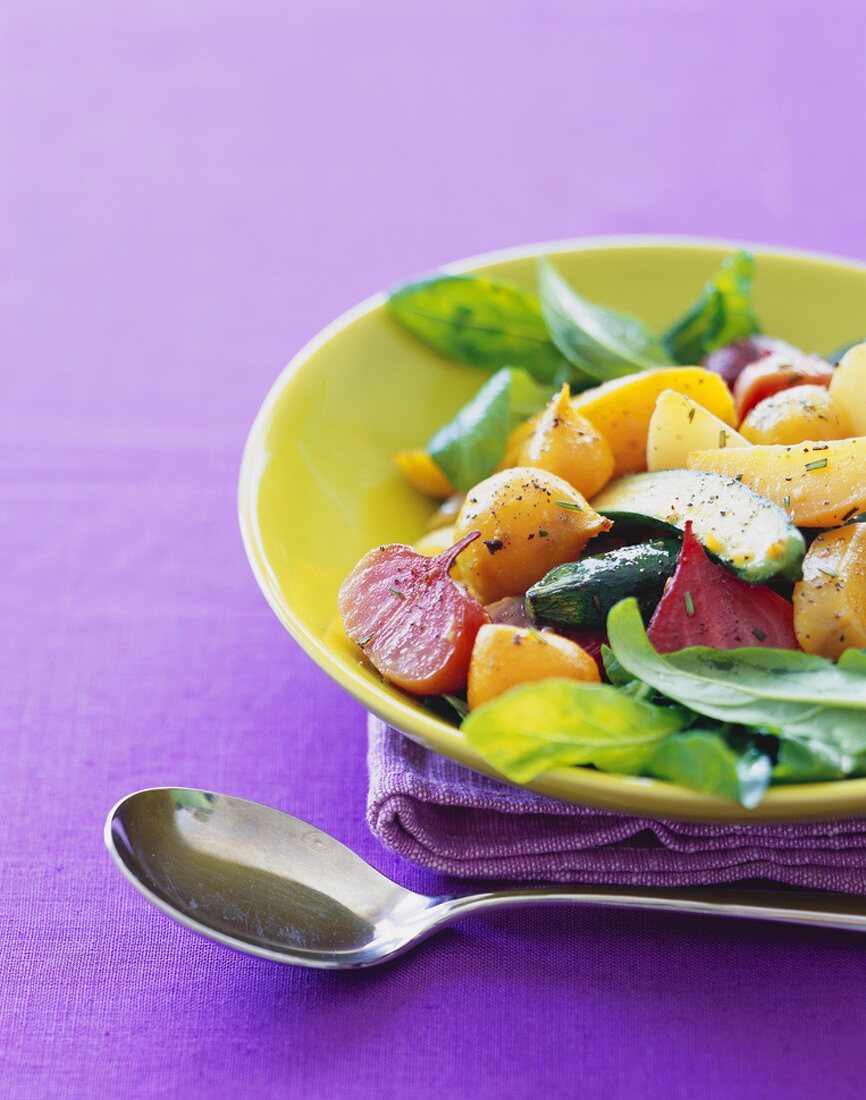 Colorful Bowl of Roasted Vegetables with Arugula