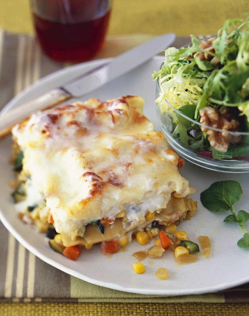 A Piece of Vegetable Lasagna with Salad