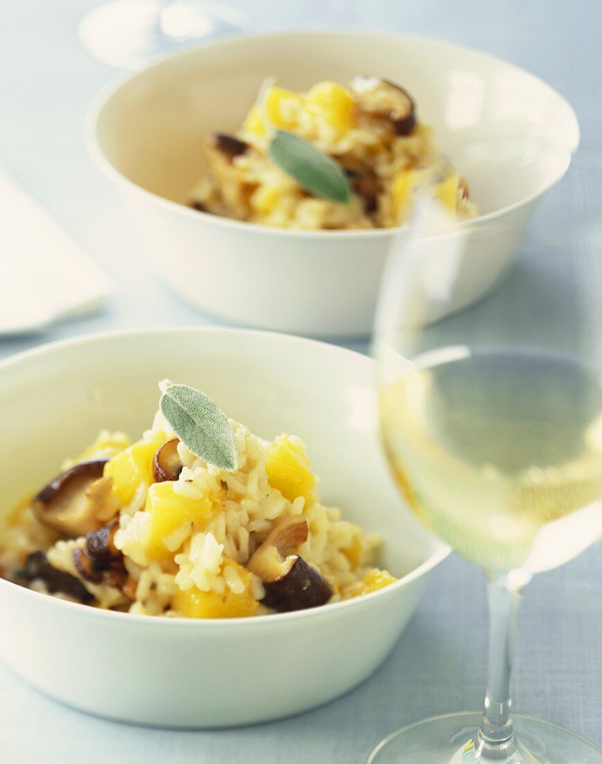 Two Bowls of Mushroom, Squash and Sage Risotto with White Wine