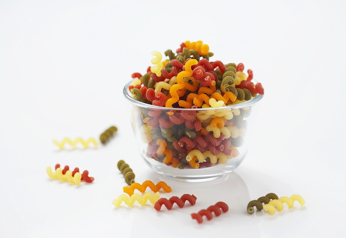 Bowl Full of Multi-Colored Vegetable Corkscrew Pasta